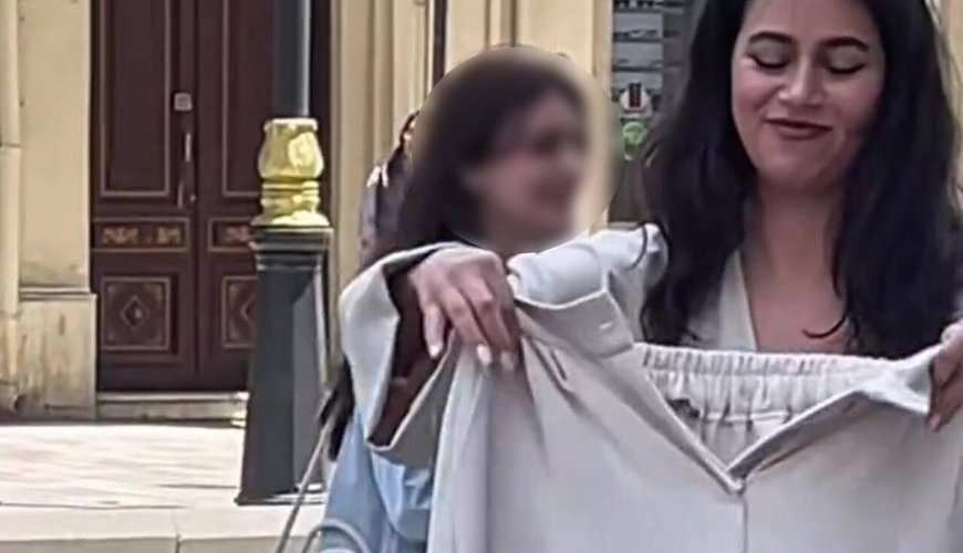 Bakıda qızı küçədə "soyundurub" reklam çəkdilər - VİDEO